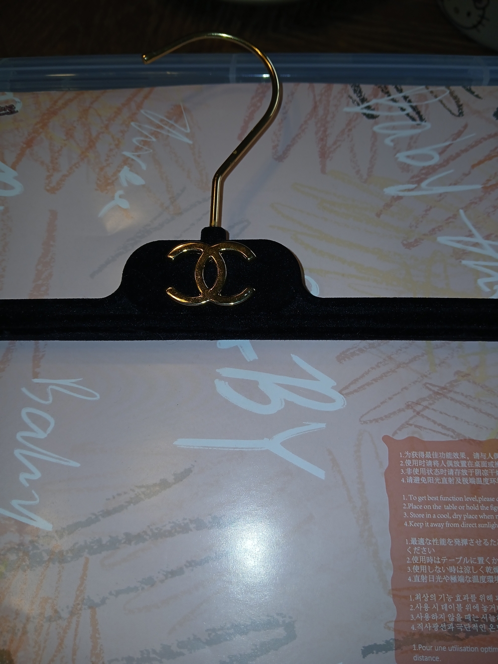 Authentic Chanel Velvet Gold-Tone Logo Skirt Hanger - Black & Gold